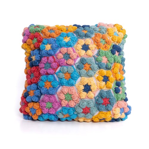 Colorful handmade crochet pillow from the Cozy Home and Style free ebook