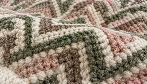 Close-up of overlay mosaic crochet blanket showing geometric diamond colorwork
