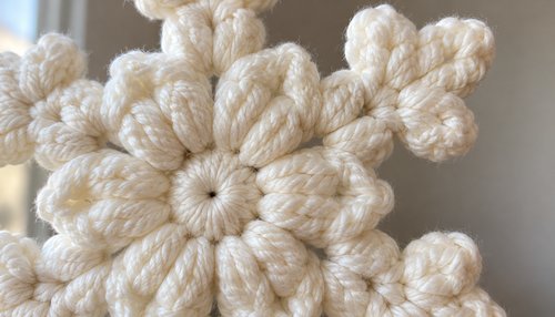 Close-up of puff stitches on a chunky crochet snowflake ornament