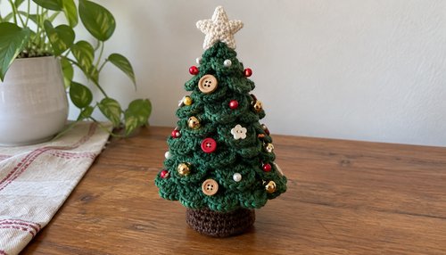 Decorated crochet Christmas tree with buttons and beads