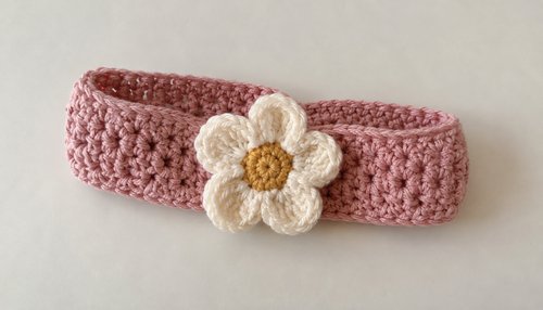 Pink crochet baby headband with white daisy flower