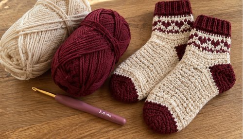 Worsted weight yarn and 5.0 mm crochet hook for crochet socks